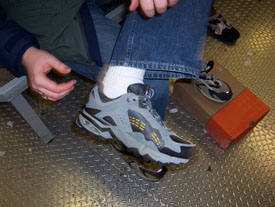 [Odie's first attempt at shoes]